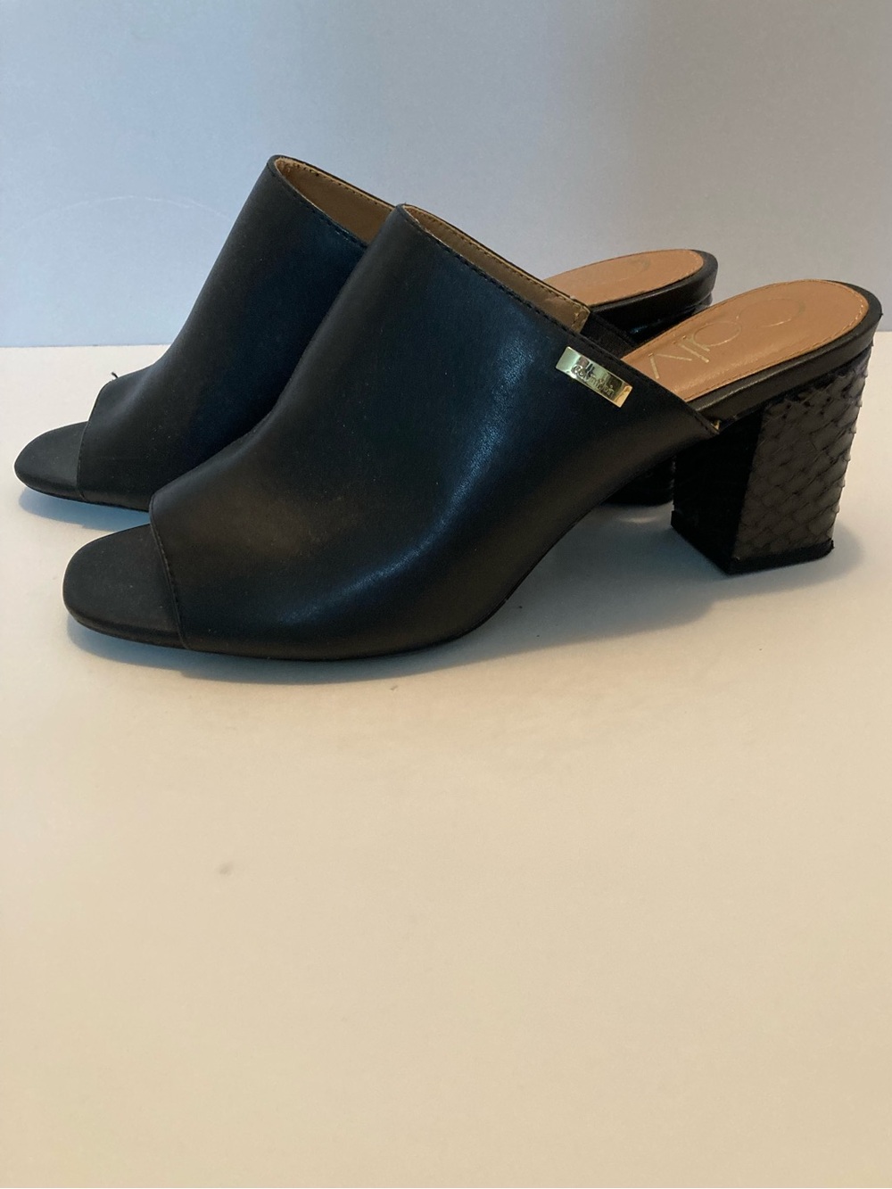 Calvin Klein Black Open-Toe Block Heel Mules. Item# TSm2